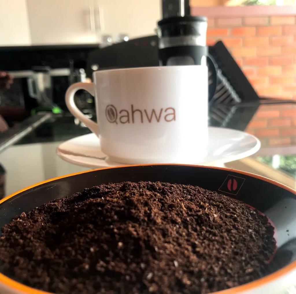 Qahwa coffee cup and fresh grounds